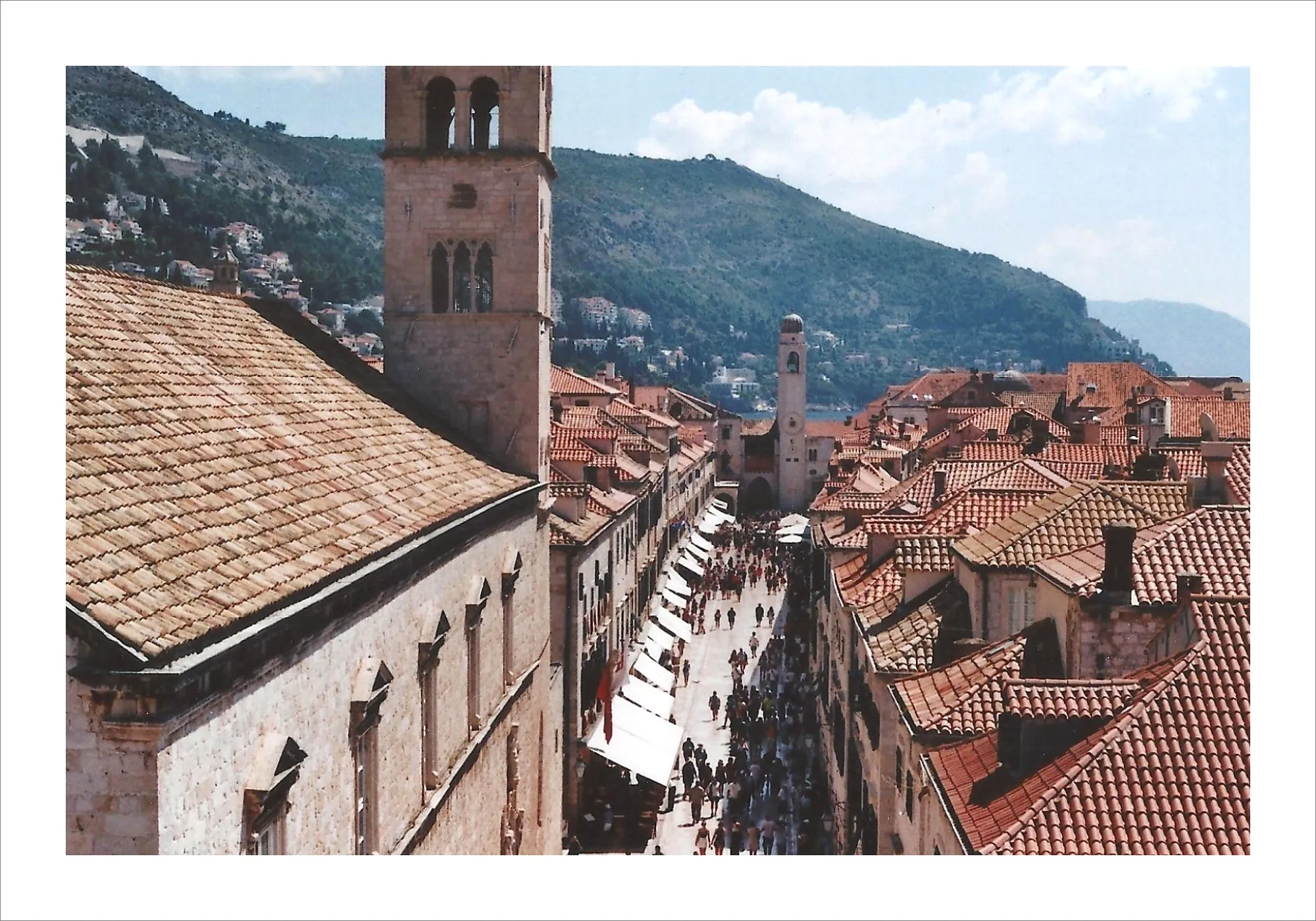 Dubrovnik old town street view from above with terracotta roofs.